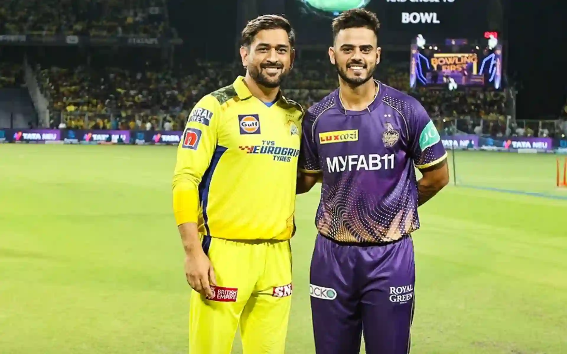 MS Dhoni and Nitish Rana pose after the toss. [Source: @CricInformer/X]