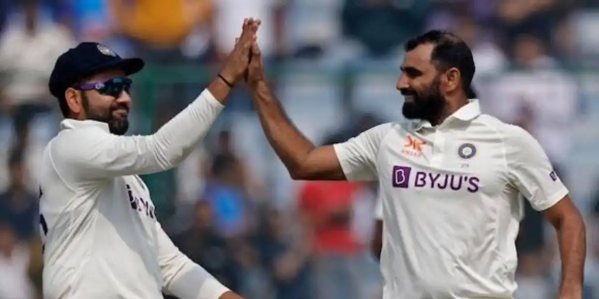 Mohammed Shami with Rohit Sharma [Source: @rushiii_12/X.com]