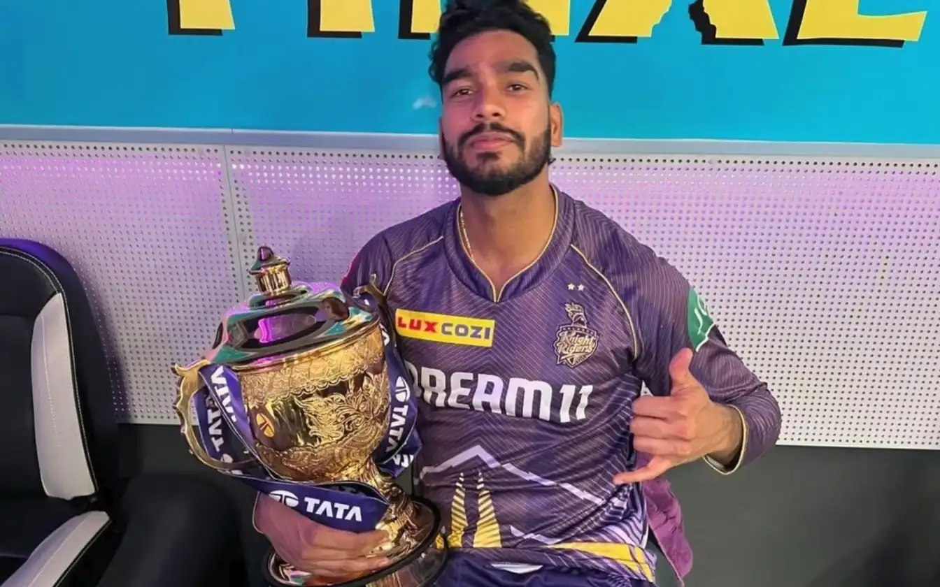 Venkatesh Iyer with IPL 2024 trophy [Source: @KnightsVibe/X.com]