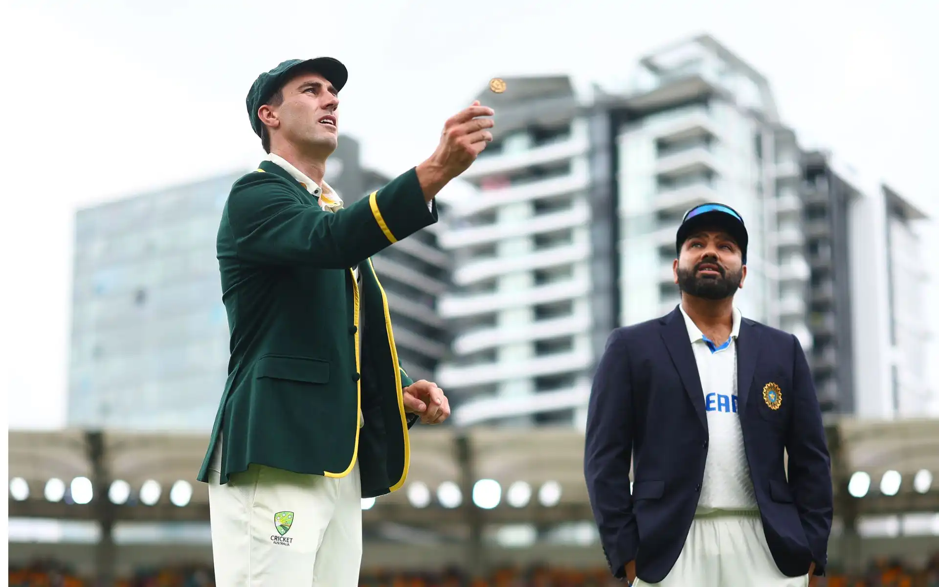 Pat Cummins and Rohit Sharma during Toss of third Test [Source: @Avinashkmratish/x.com]