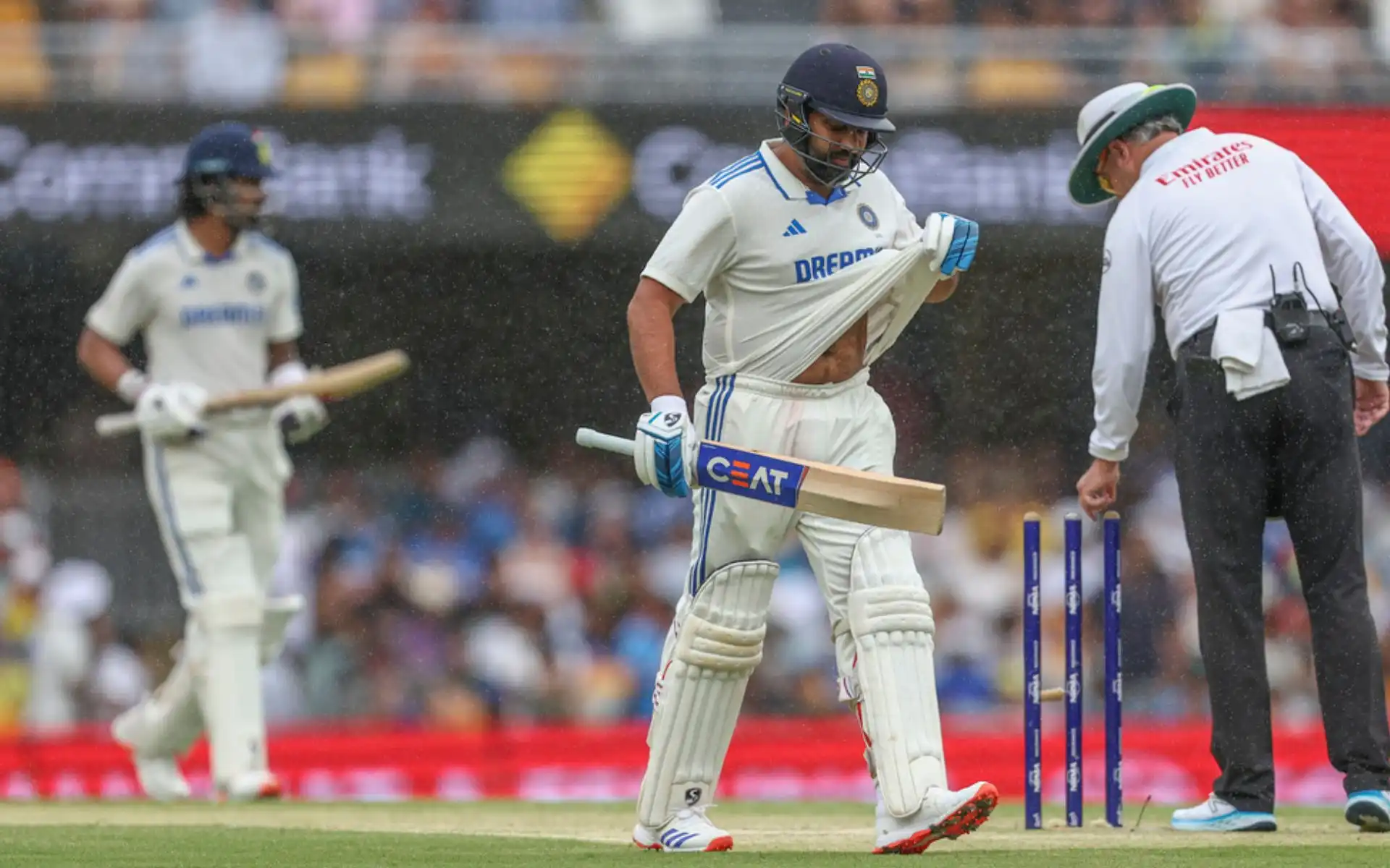 Indian batters walking off the field (Source: AP Photos)