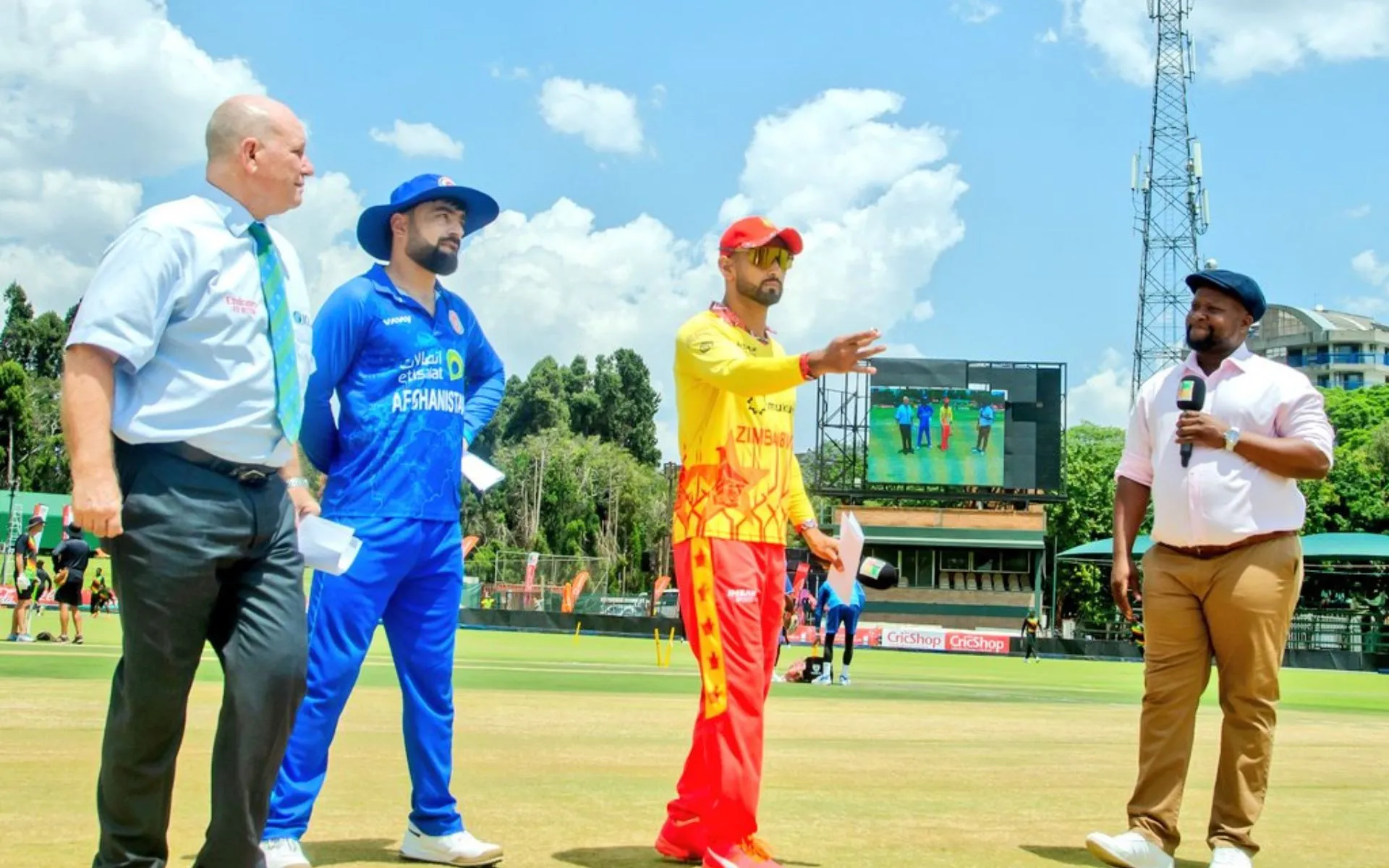 Rashid Khan and Sikandar Raza during the toss (Source: @AfghanAtlan1/x.com)