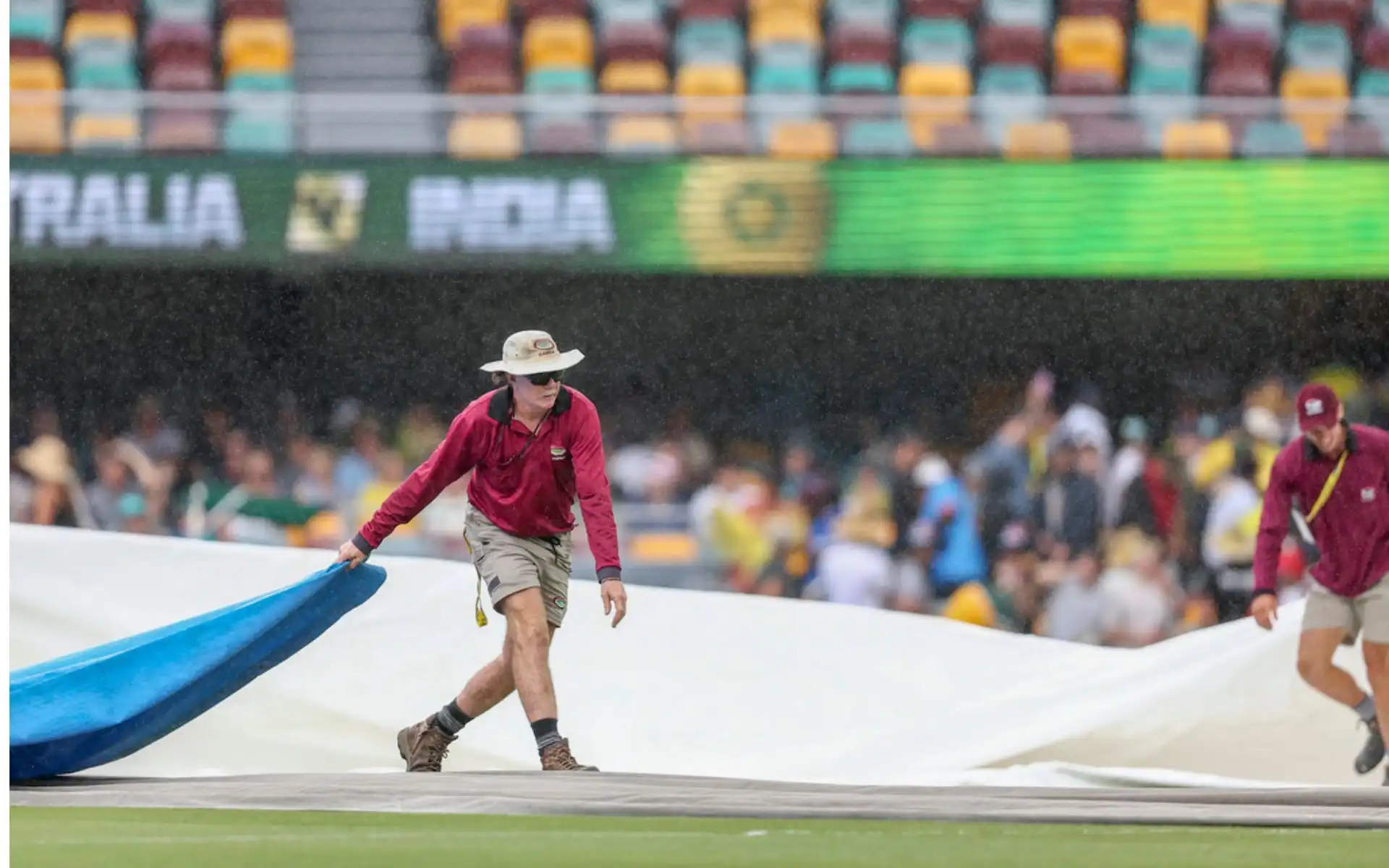 Groundstaff with covers (Source: AP Photos)