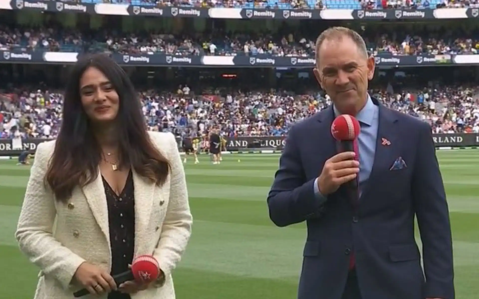 Mayanti Langer and Justin Langer hosting at MCG [Source: @ameye_17/X.com]
