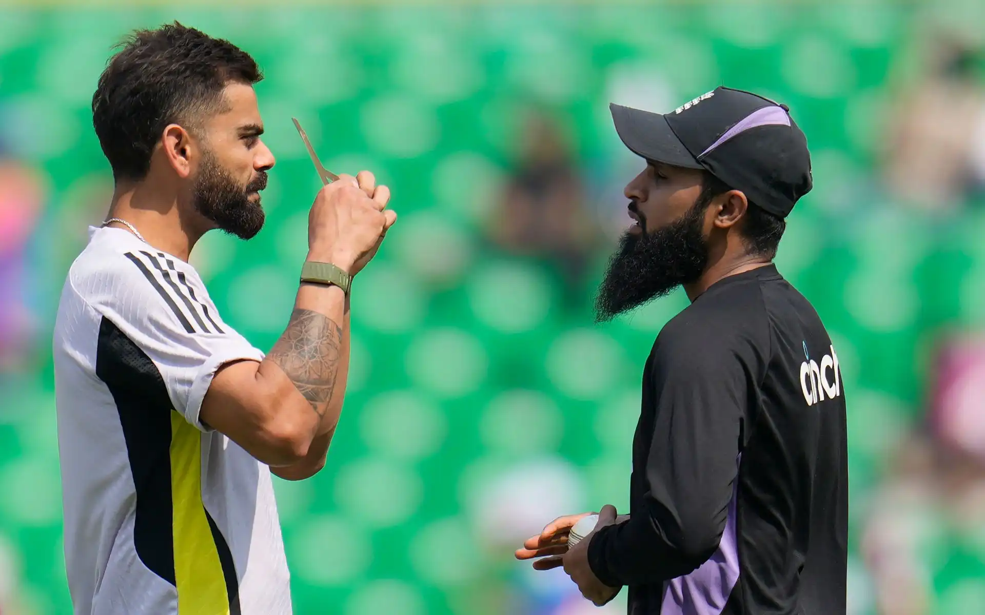 Virat Kohli and Adil Rashid having a chat (Source: AP Photos)