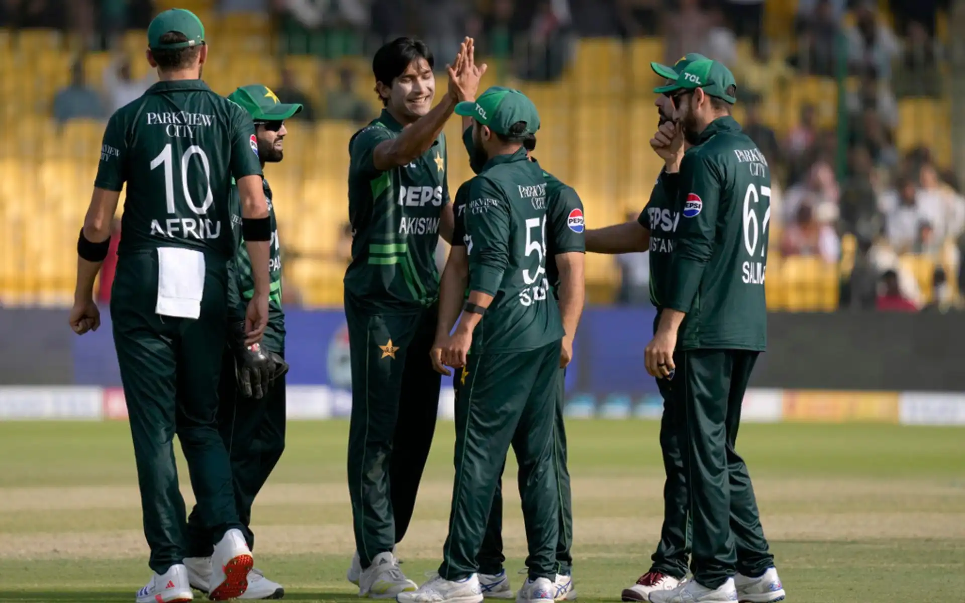Mohammad Hasnain with his teammates [Source: AP]