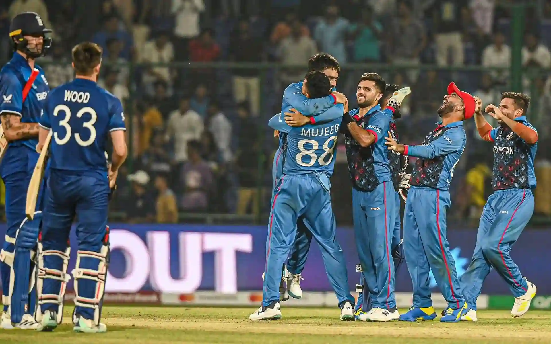 Afghan players celebrate a historic win. [Source: @PrakashSingh_73/X]
