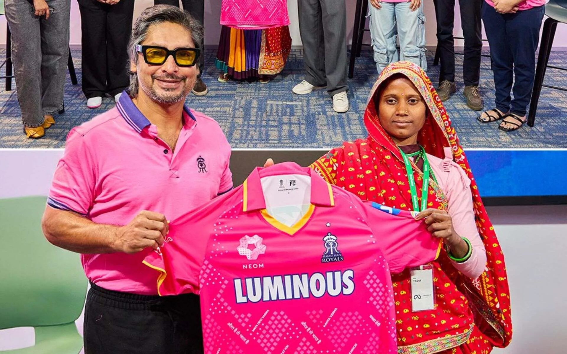 Kumar Sangakkara presents the Pink Promise Jersey to Thavri Devi. [Source: @rajasthanroyals/X]