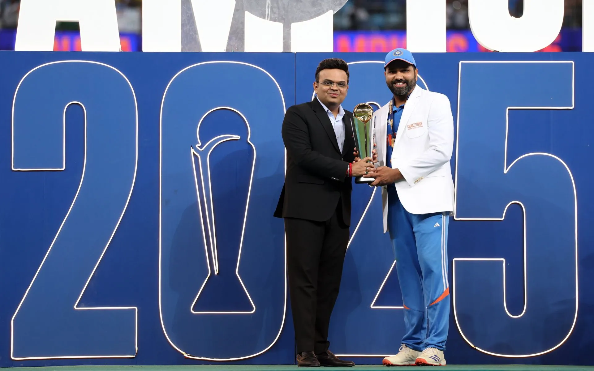 Rohit Sharma collects Champions Trophy title from ICC Chairman Jay Shah [Source: @BCCI/X.com]