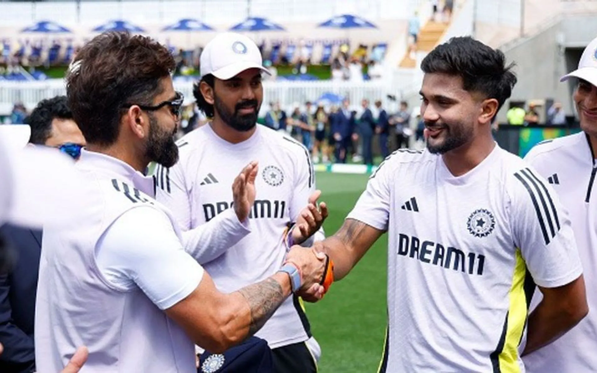 Nitish Reddy Recieving His Test Cap From Virat Kohli (Source: @mufaddal_vohra/x.com)