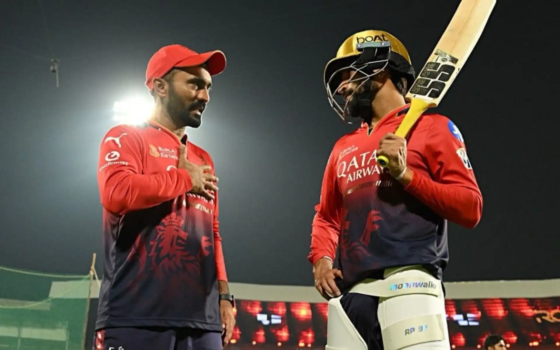 Dinesh Karthik with RCB captain Rajat Patidar [Source: @RCBTweets/x]