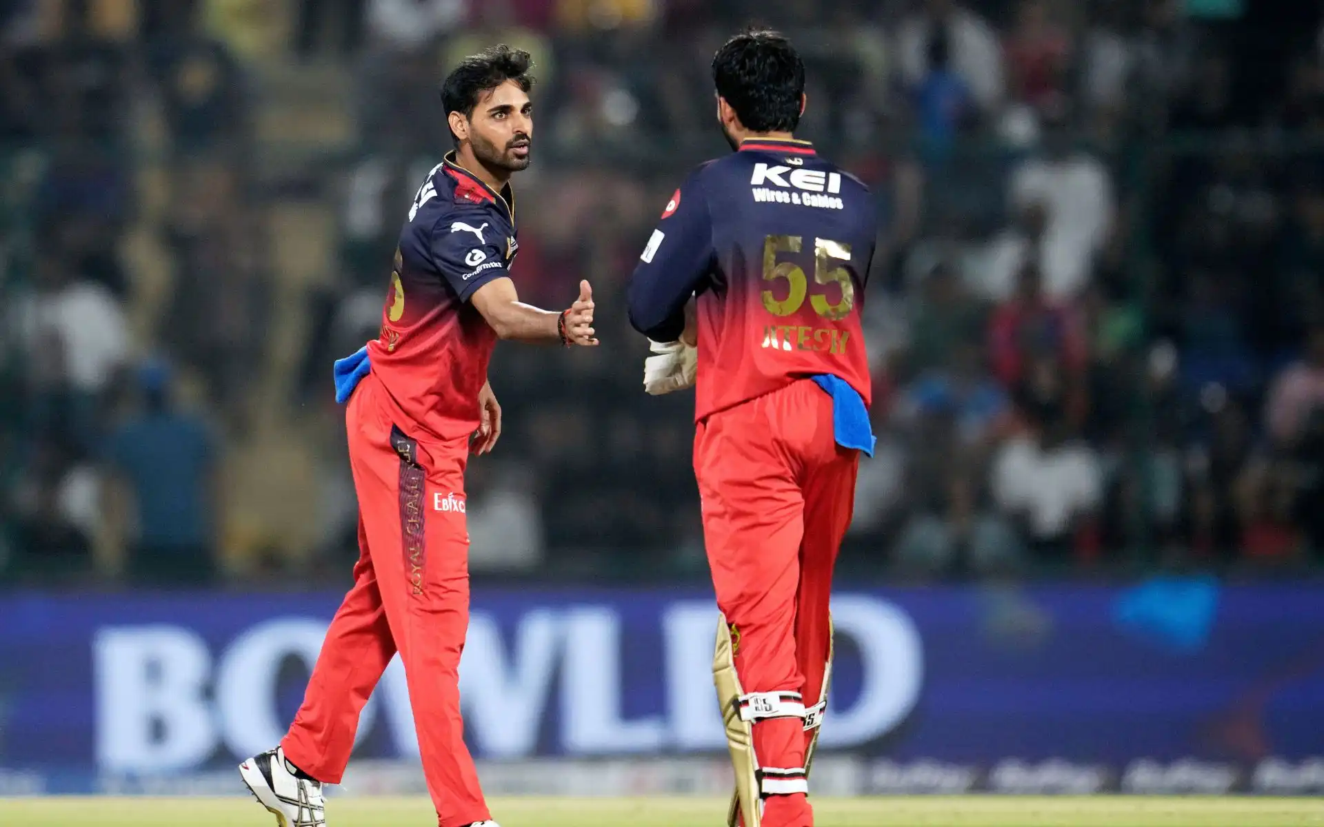 Bhuvneshwar Kumar celebrating a wicket with Virat Kohli [Source: AP Photos]