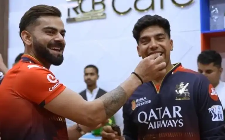 Virat Kohli with Swastik Chikara [Source: @Monish09cric/x.com]