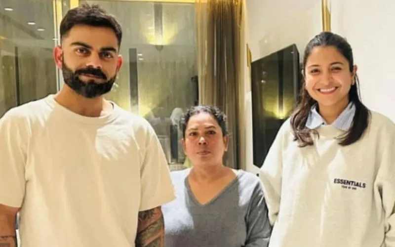 Virat Kohli And Anushka Sharma Beam With Joy In A Cozy New Pic With A Fan