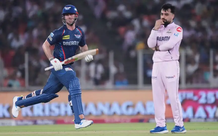 Rashid Khan after being hit by Mitchell Marsh [Source: AP Photos]