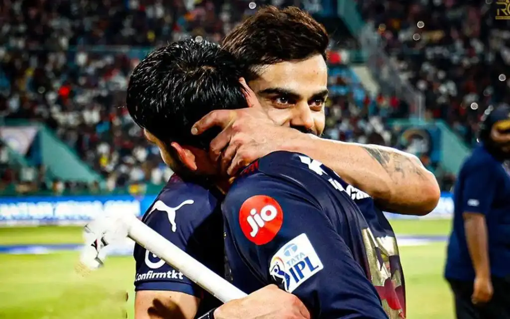 Virat Kohli hugging Jitesh Sharma [Source: @CricCrazyJohns/X]