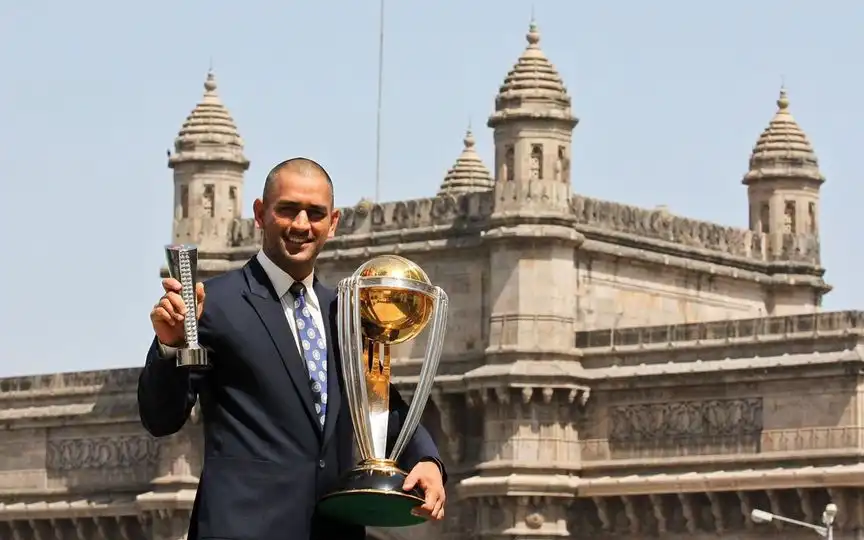 MS Dhoni with World Cup trophy (Source:@TheCricInsights/X.com)