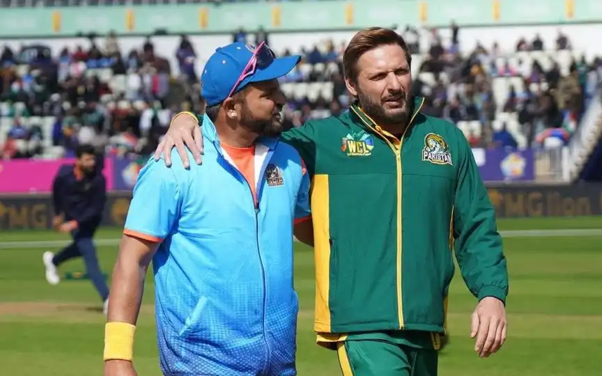 Suresh Raina with Shahid Afridi [Source: @RichKettle07/X.com]