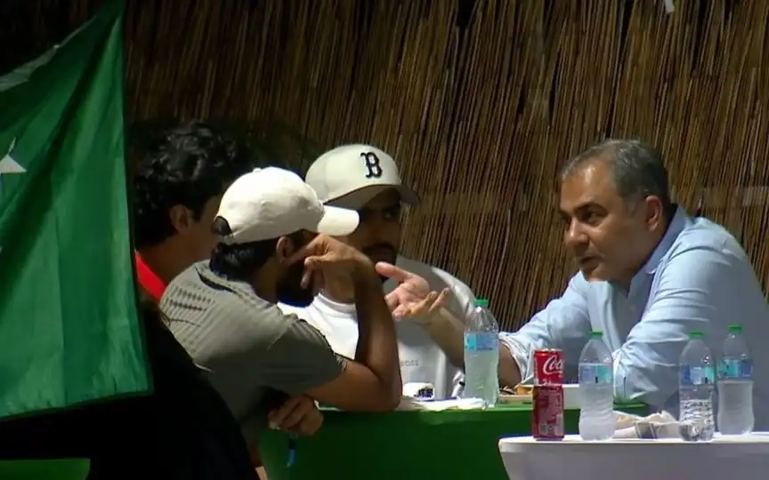 Pakistan players having a conversation with Mohsin Naqvi [Source: @iMSIDPAK/X.com]