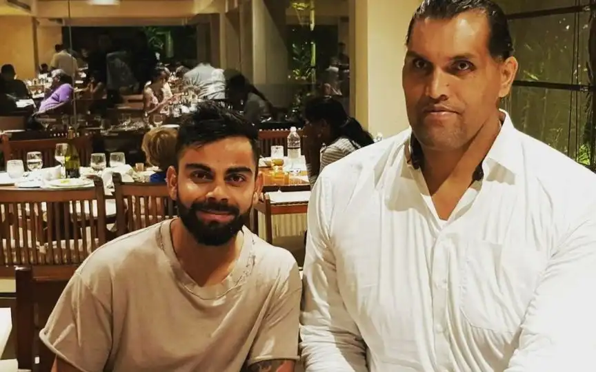 Virat Kohli with The Great Khali (Source:@CricCrazyJohns/X.com)