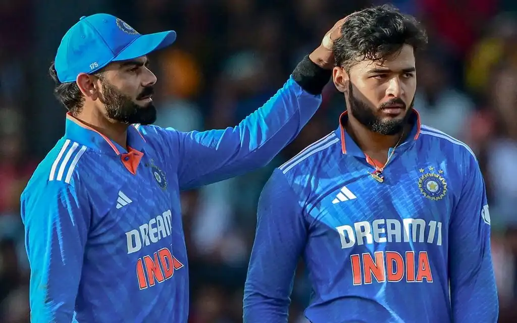 Riyan Parag and Virat Kohli - (Source : AFP)