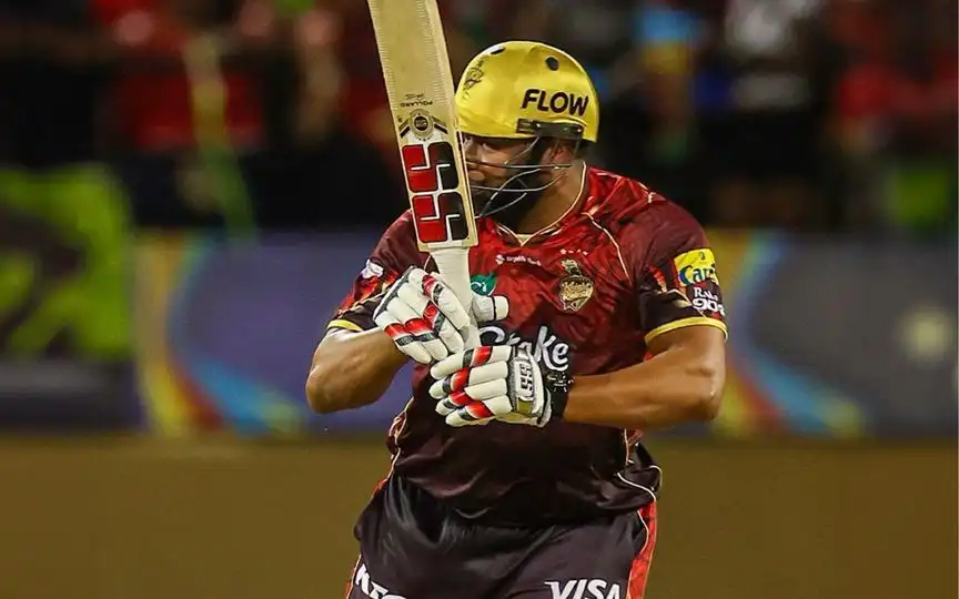 Kieron Pollard etches a 17-ball fifty [Source: @TKRiders/X.com]
