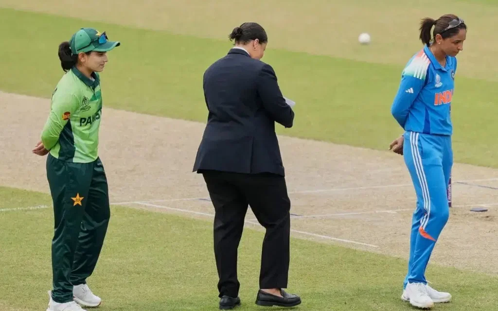 Harmanpreet Kaur and Fatima Sana during toss [Source: @koolfi_kamath/X.com]