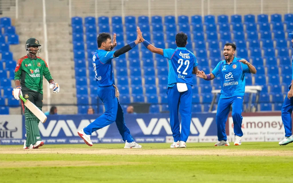Afghanistan players celebrating a Bangladesh wicket [Source: @ACBofficials/x]