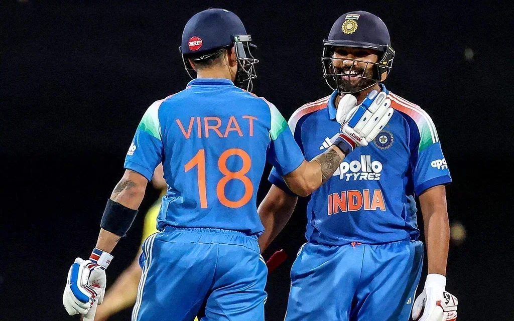 Virat Kohli and Rohit Sharma after pairing up at Sydney for 167-run partnership [Source: AFP Photos]