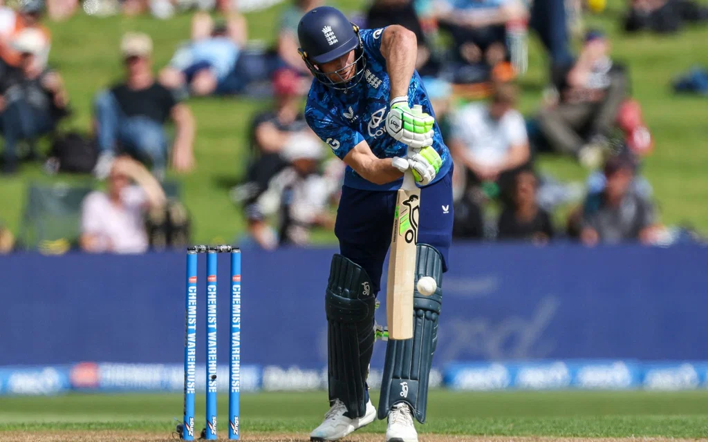 Jos Buttler goes past Ian Bell [Source: AFP]