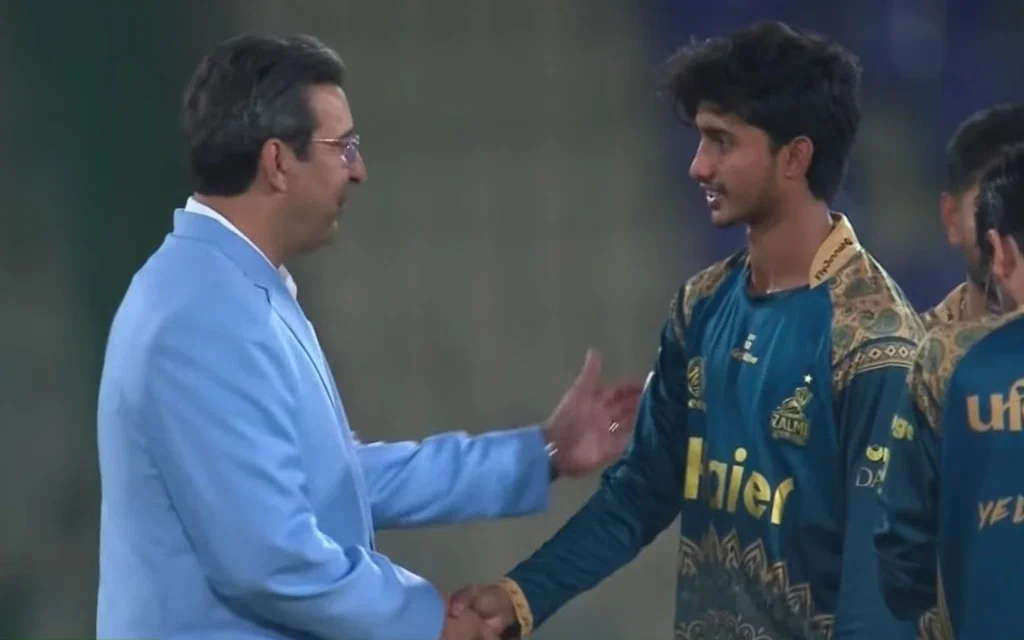 Wasim Akram shaking hands with Ali Raza [Source: @CallMeSheri1_/X.com]