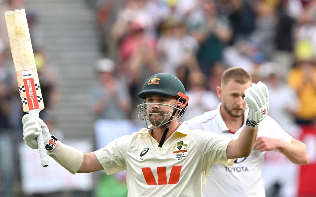Travis Head celebrating his 69-ball hundred [Source: AFP Photos]