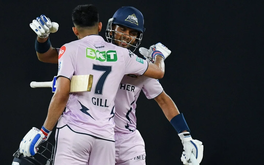 Dasun Shanaka with GT captain Shubman Gill [Source: AFP]