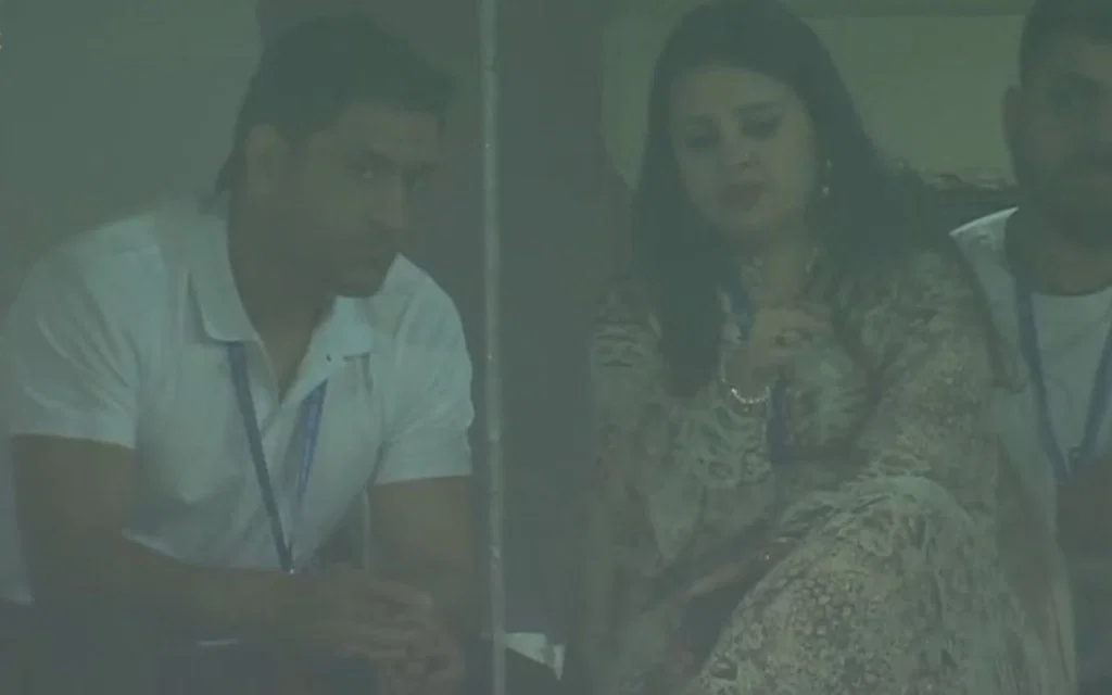 MS Dhoni with wife Sakshi in Ranchi Stadium. [Source - @thodasasanskari/x.com]