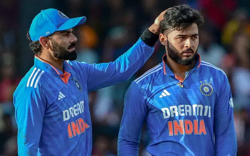 रियान पराग और विराट कोहली - (AFP)