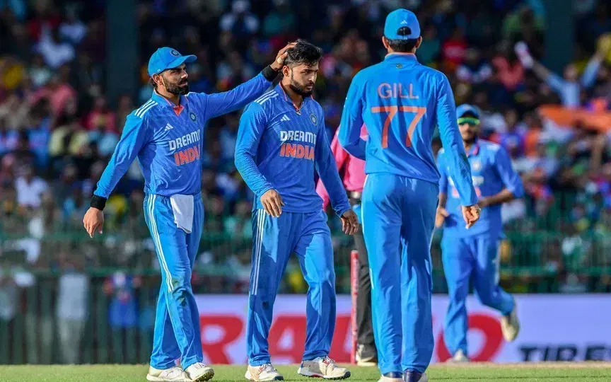 विराट कोहली और रियान पराग (AFP)