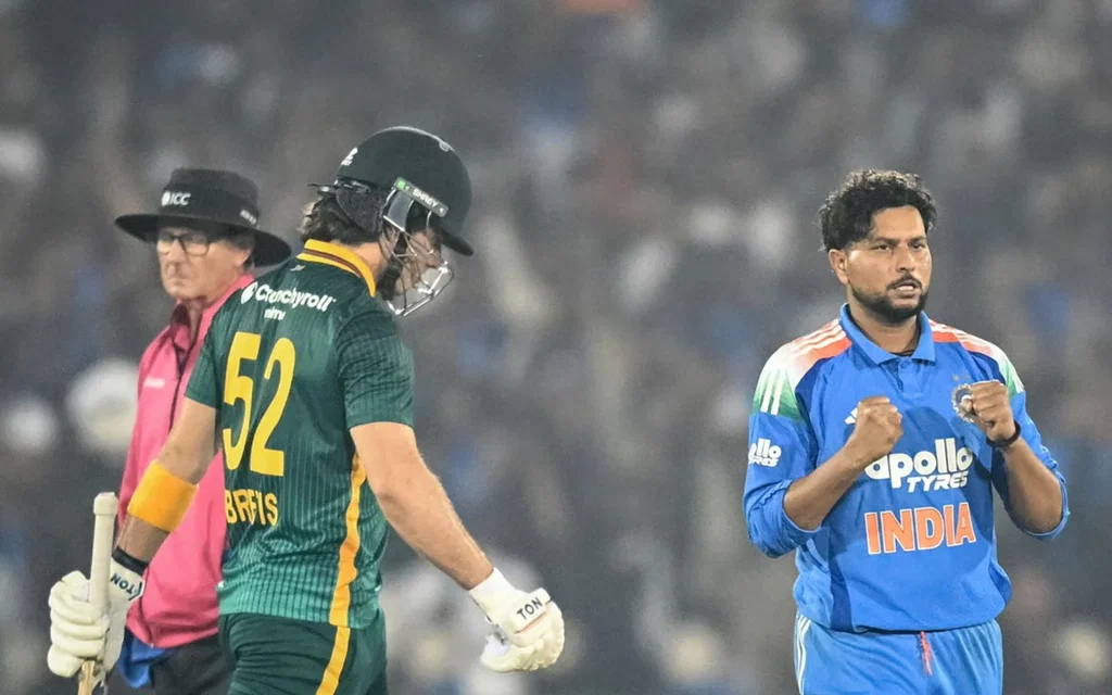 Dewald Brevis and Kuldeep Yadav - (Source: AFP)