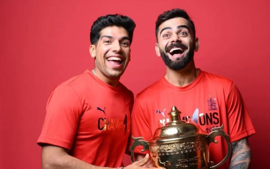 Swastik Chikara and Virat Kohli - (Source: IPL/X.com)