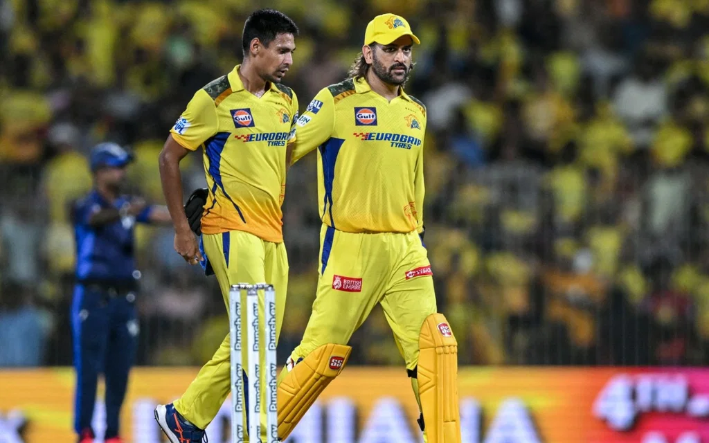 Mustafizur Rahman and MS Dhoni - (Source: AFP)