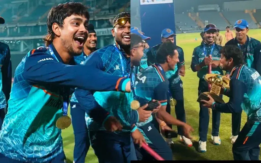 Ishan Kishan celebrates with the trophy [Source: @mufaddal_vohra/X]
