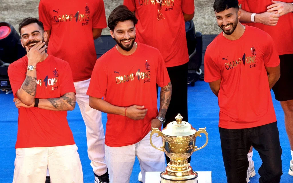 RCB's Virat Kohli (L), Skipper Rajat Patidar (C), and Devdutt Padikkal (R) (Source: AFP)