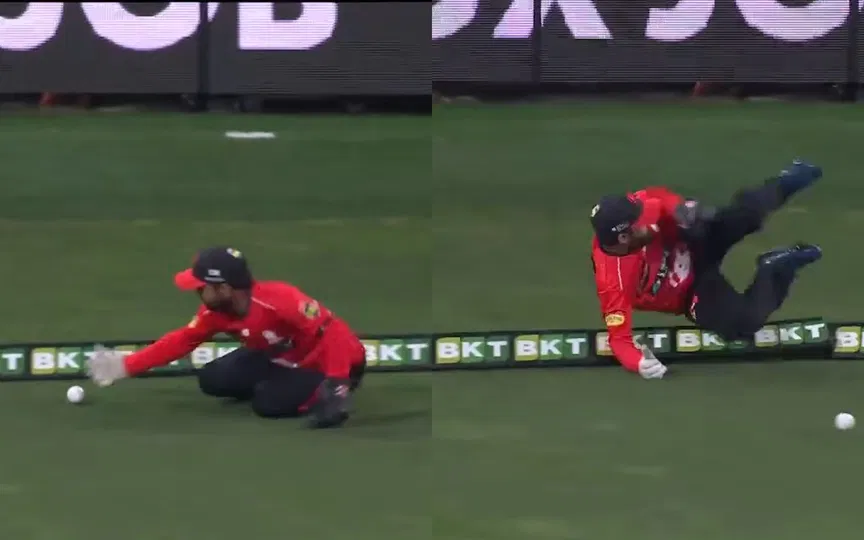 Rare Sight: Wicketkeeper Mohammad Rizwan dives at the boundary rope to save a four in BBL15