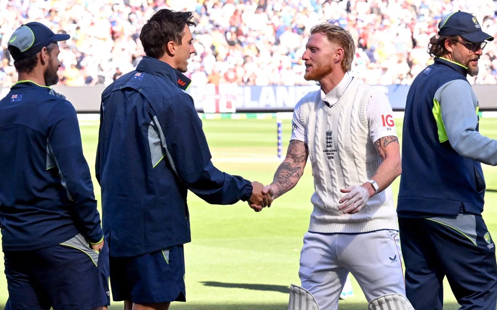 Pat Cummins and Ben Stokes shake hands after MCG Test (Source: AFP)