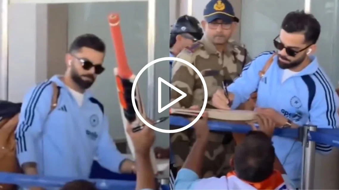 Virat Kohli signs bat for special fan [Source: @Trend_VKohli/X]
