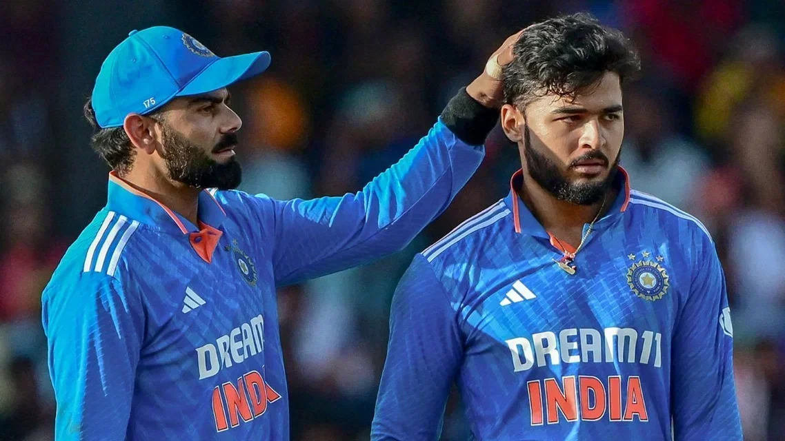 Virat Kohli and Riyan Parag - (Source: AFP)