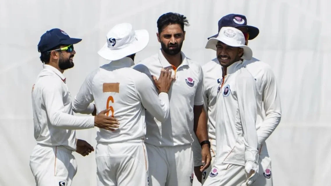 Auqib Nabi celebrating with the team [Source: X]