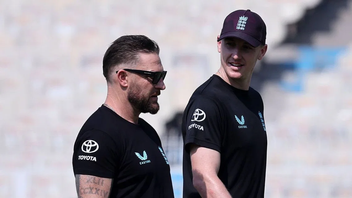 Harry Brook with Brendon McCullum. [Source - AFP]