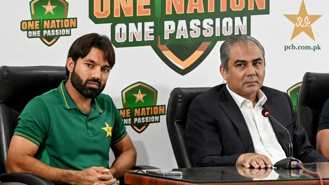 Mohsin Naqvi sitting beside Mohammad Rizwan (Source: AFP Photos)