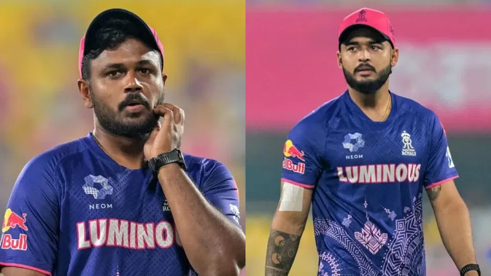 आरआर के लिए रियान पराग और संजू सैमसन [स्रोत: एएफपी]