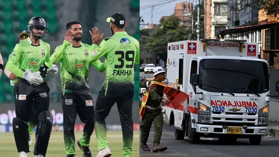 Lahore Qalandars players and an ambulance on the sidelines